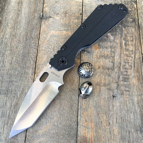 strider folding knife.